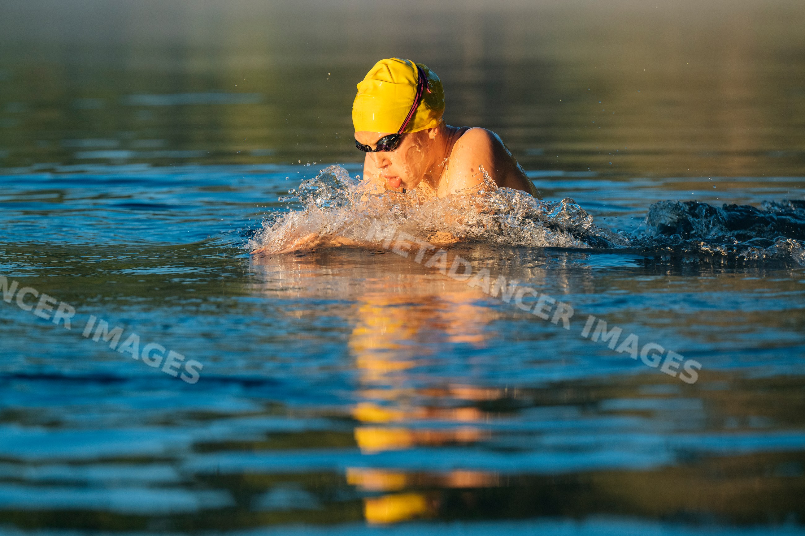 White swimmer performing breaststroke