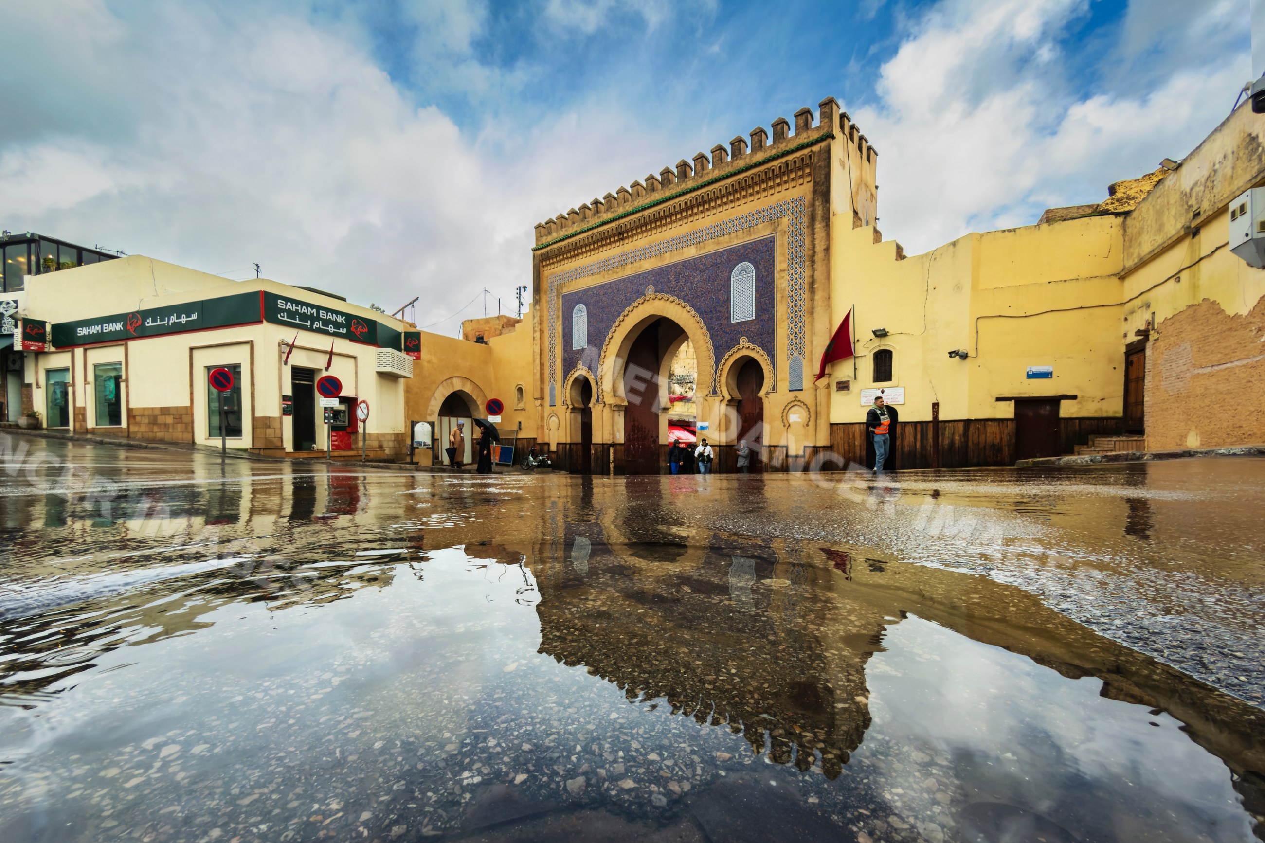 Flooded street outside the Blue Gate Bab Boujloud in fes Morocco