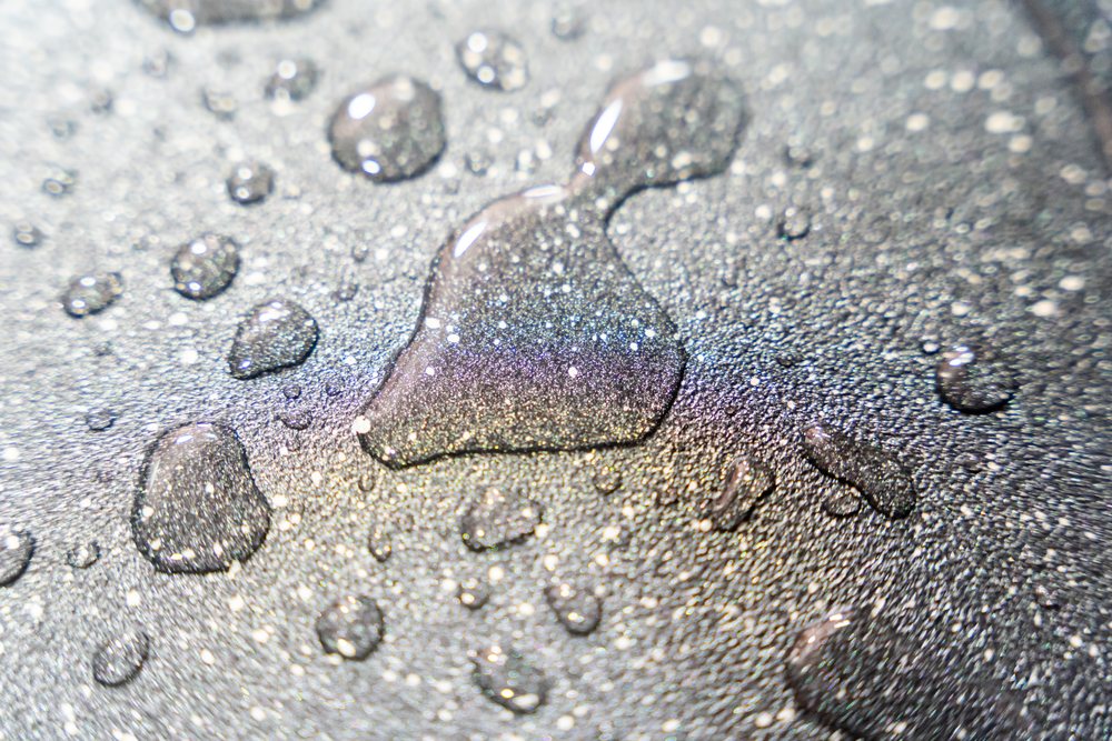 Water droplets creating a sparkling textured surface background