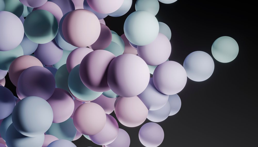 3d rendering of floating pastel-colored spheres in abstract art