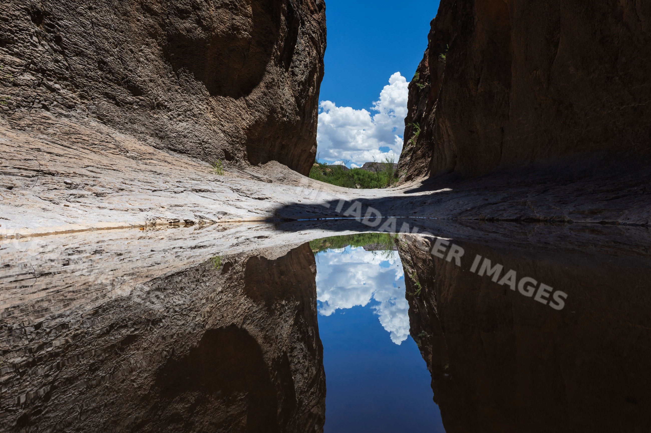 Slot canyon reflection in bigbend state ranch, lajitas, texas