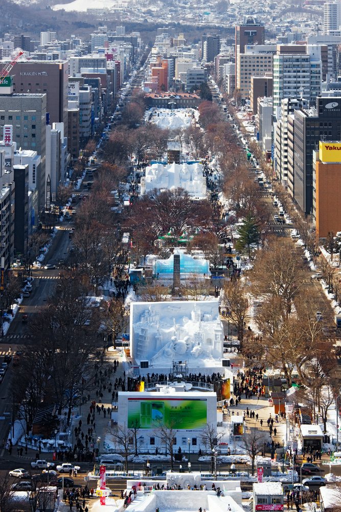 Sapporo snow festival with crowds and snow sculptures, japan