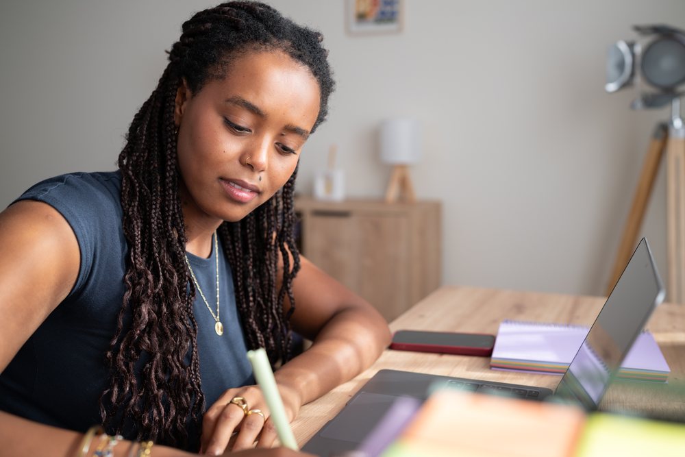 African American woman writing