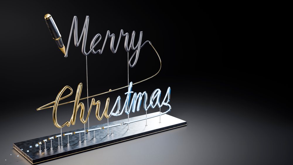Neon merry christmas light sculpture on metal base