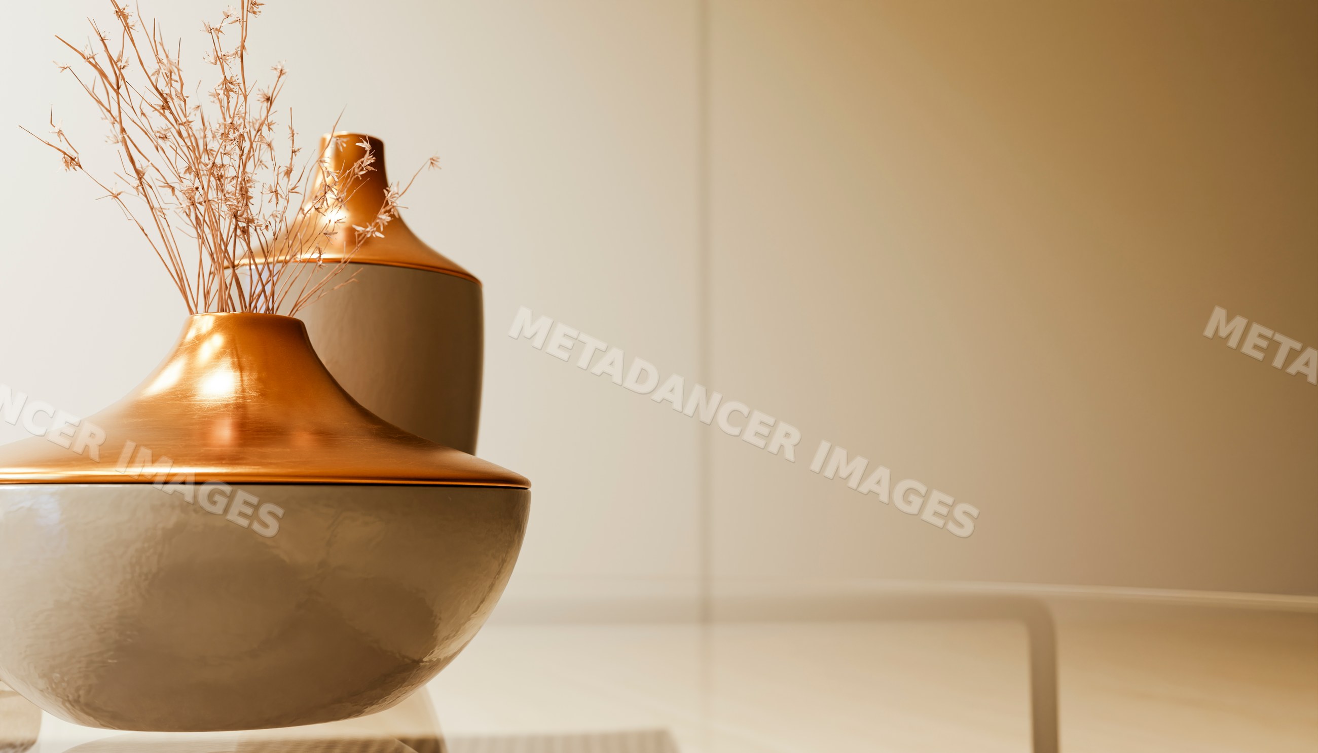 Ceramic vases with dried flowers in minimalist indoor setting