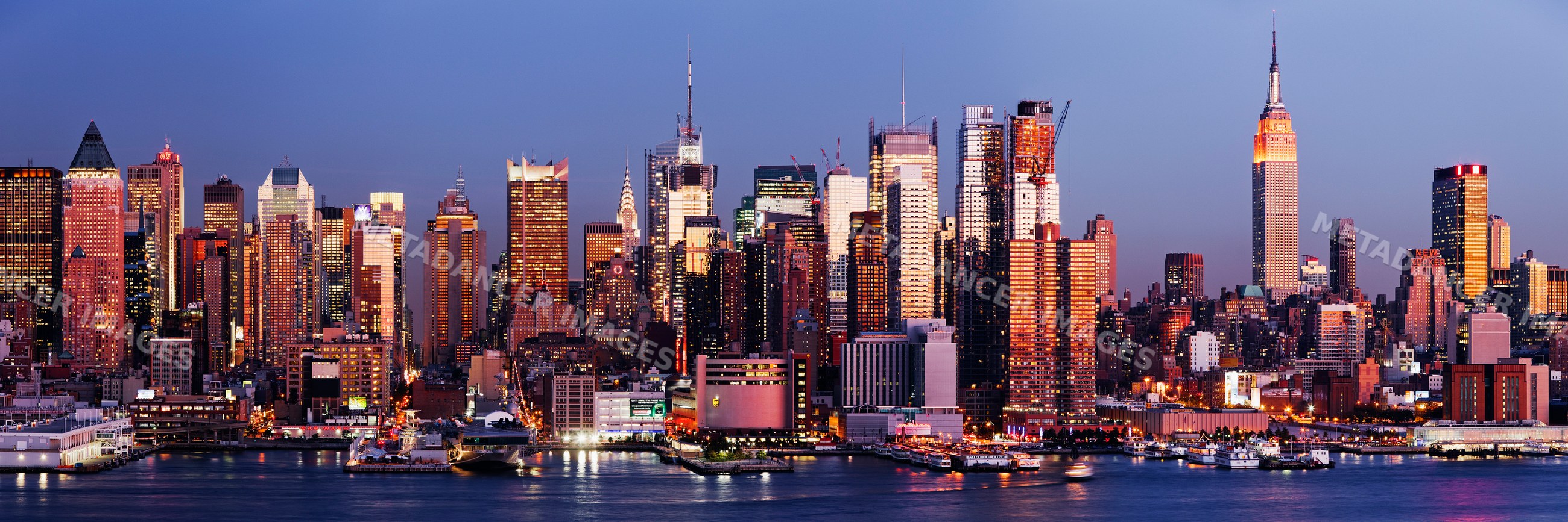New york manhattan skyline at sunset along waterfront