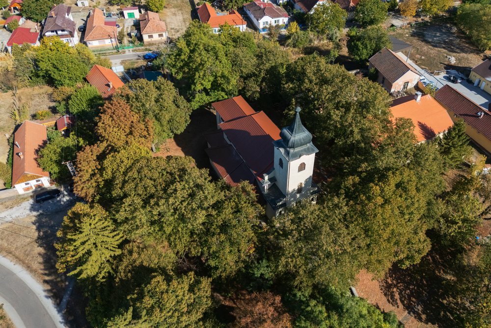 Our lady of Hungary roman catholic church surrounded by trees in novaj