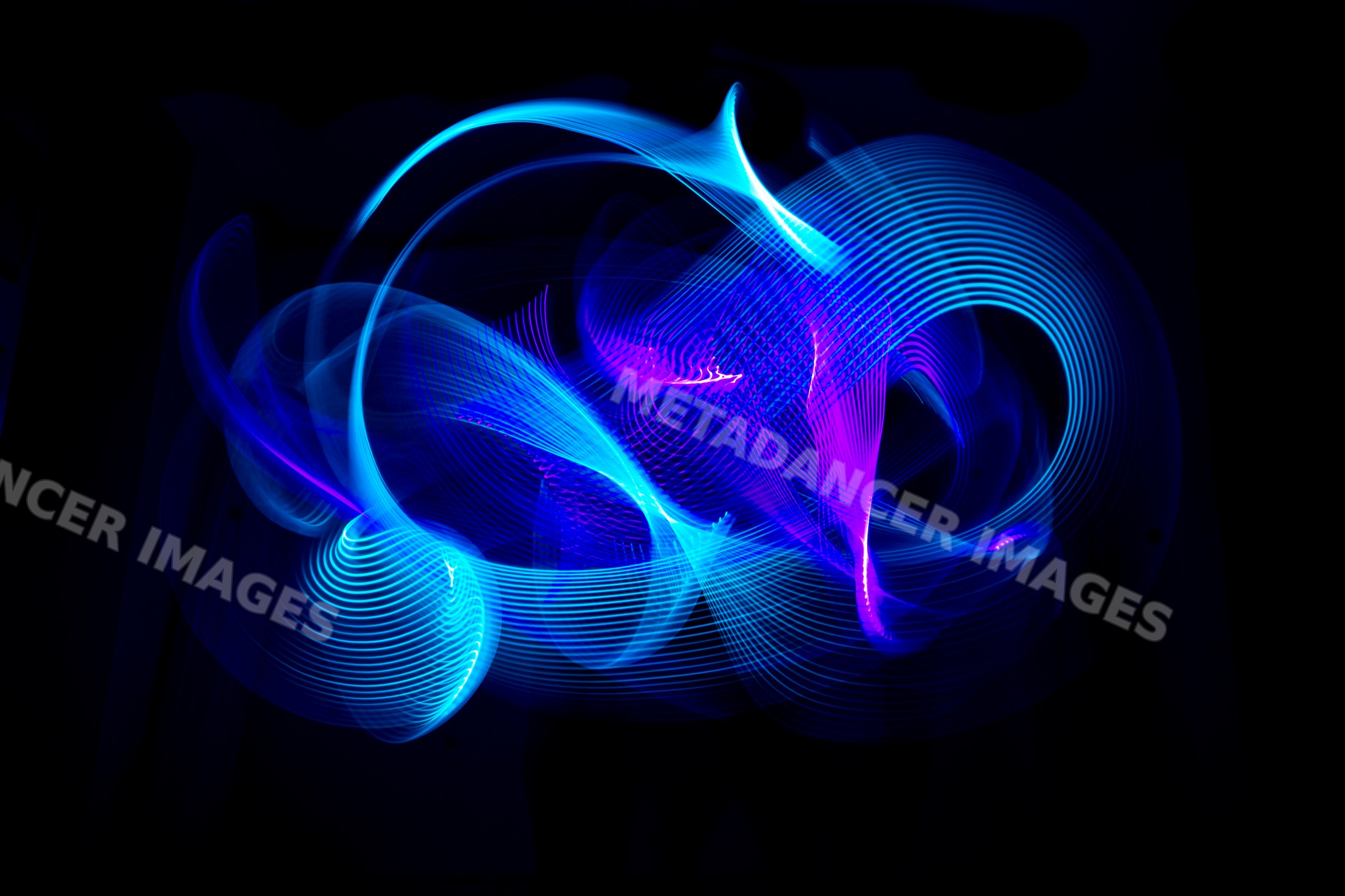 Abstract led light painting with blue and purple glowing lines