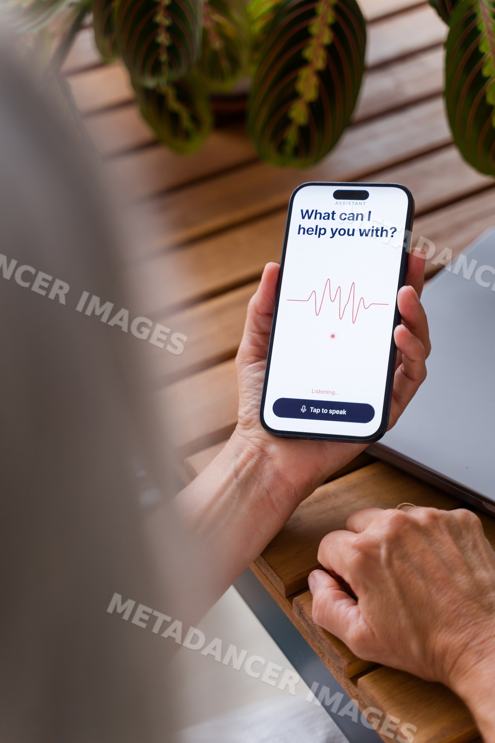 White Person using a smartphone voice assistant app