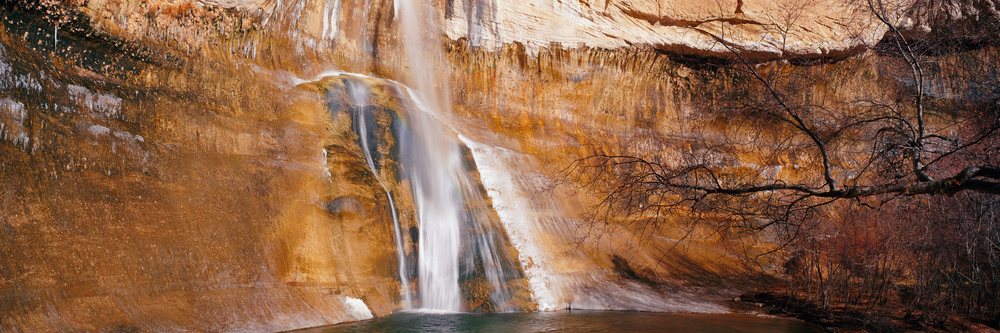 Waterfall cascading over cliff in escalante wilderness utah