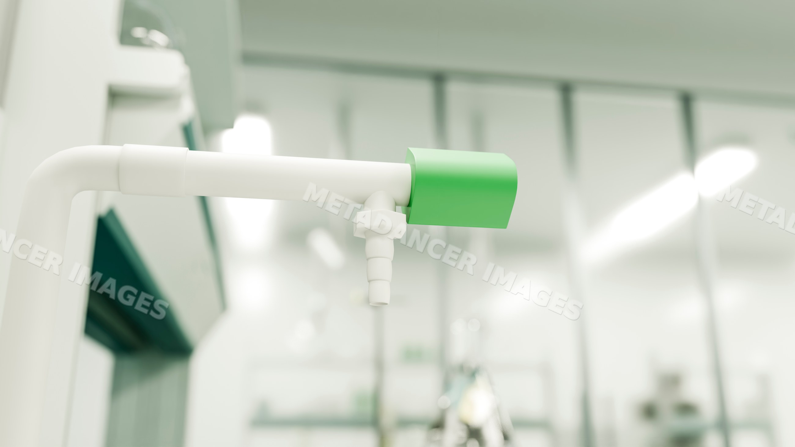 White valve with green handle on pipe in laboratory