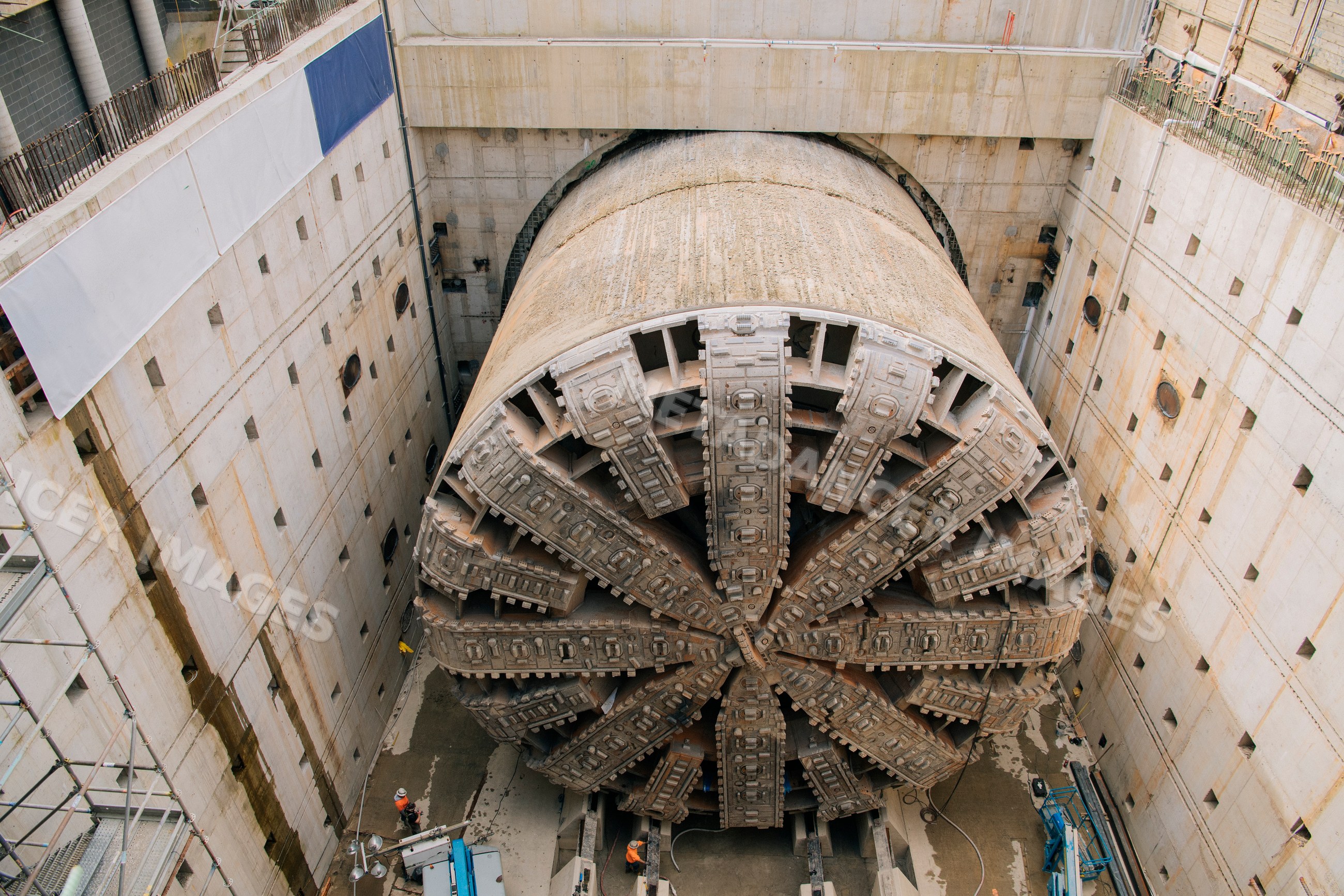 A tunnel boring machine at work inside a vertical construction shaft