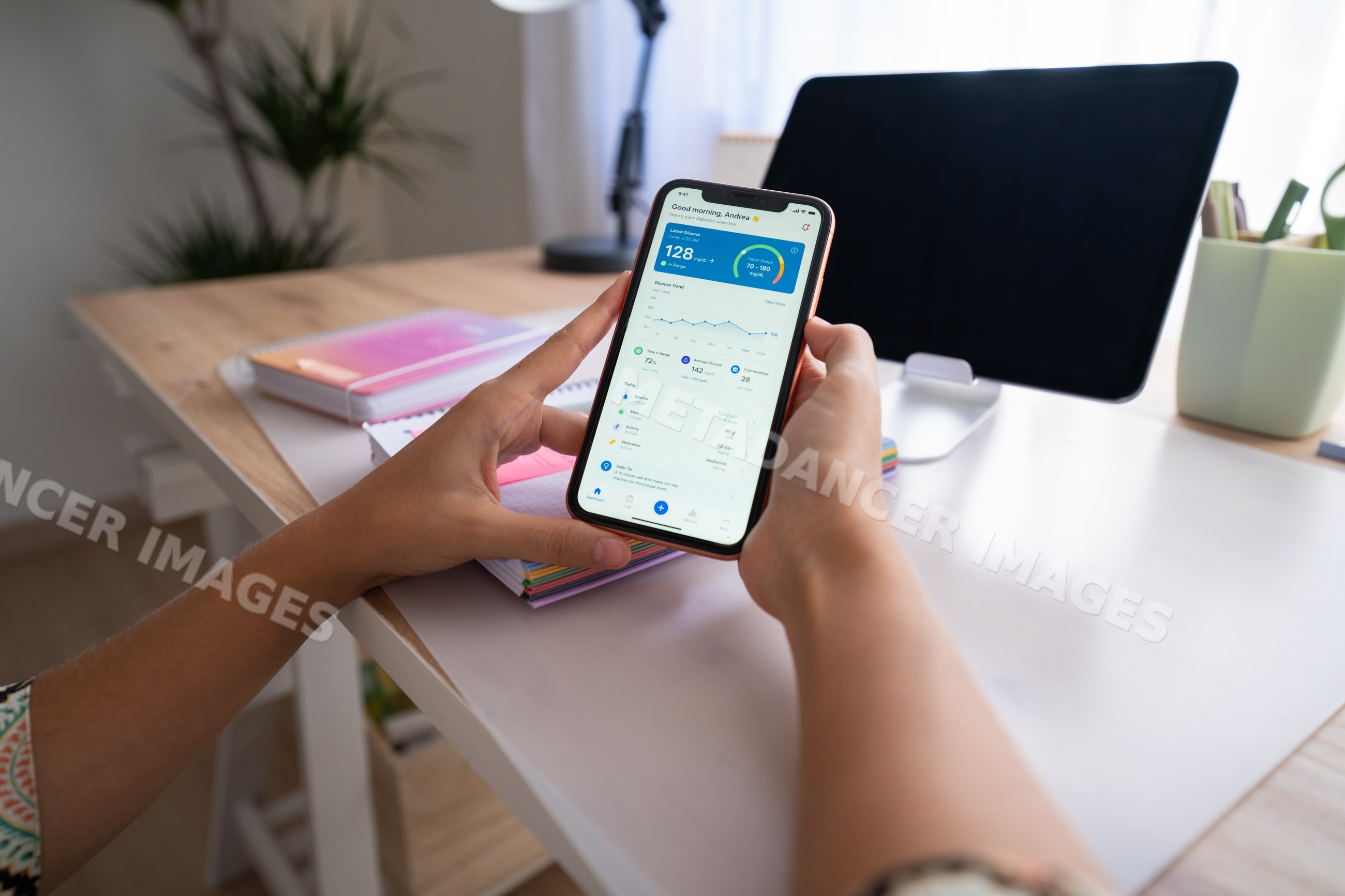 White person using diabetes management app on mobile phone