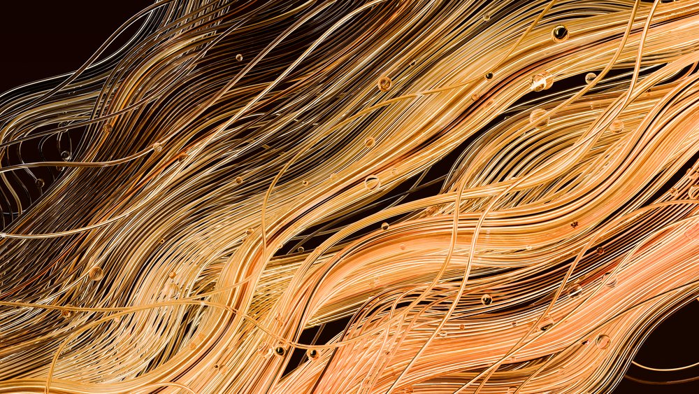 Golden flowing abstract waves with metallic texture and fluid motion