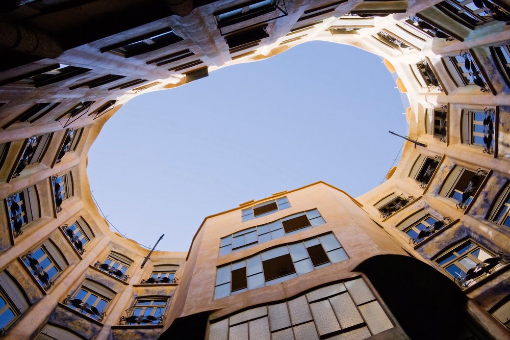 Atrium of casa mila with curved walls and balconies