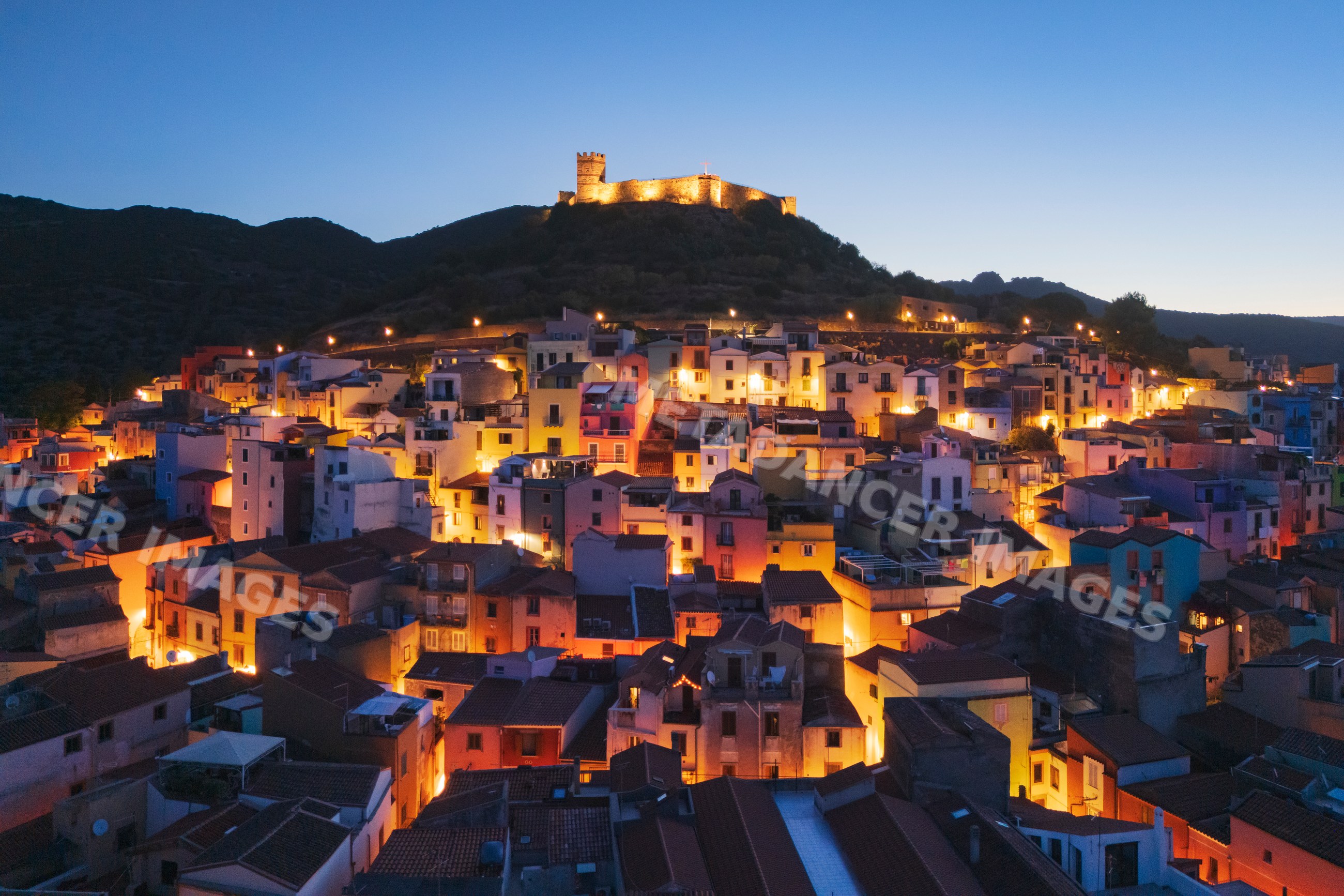Old Town of bosa in sardinia at Dawn with hilltop fortress