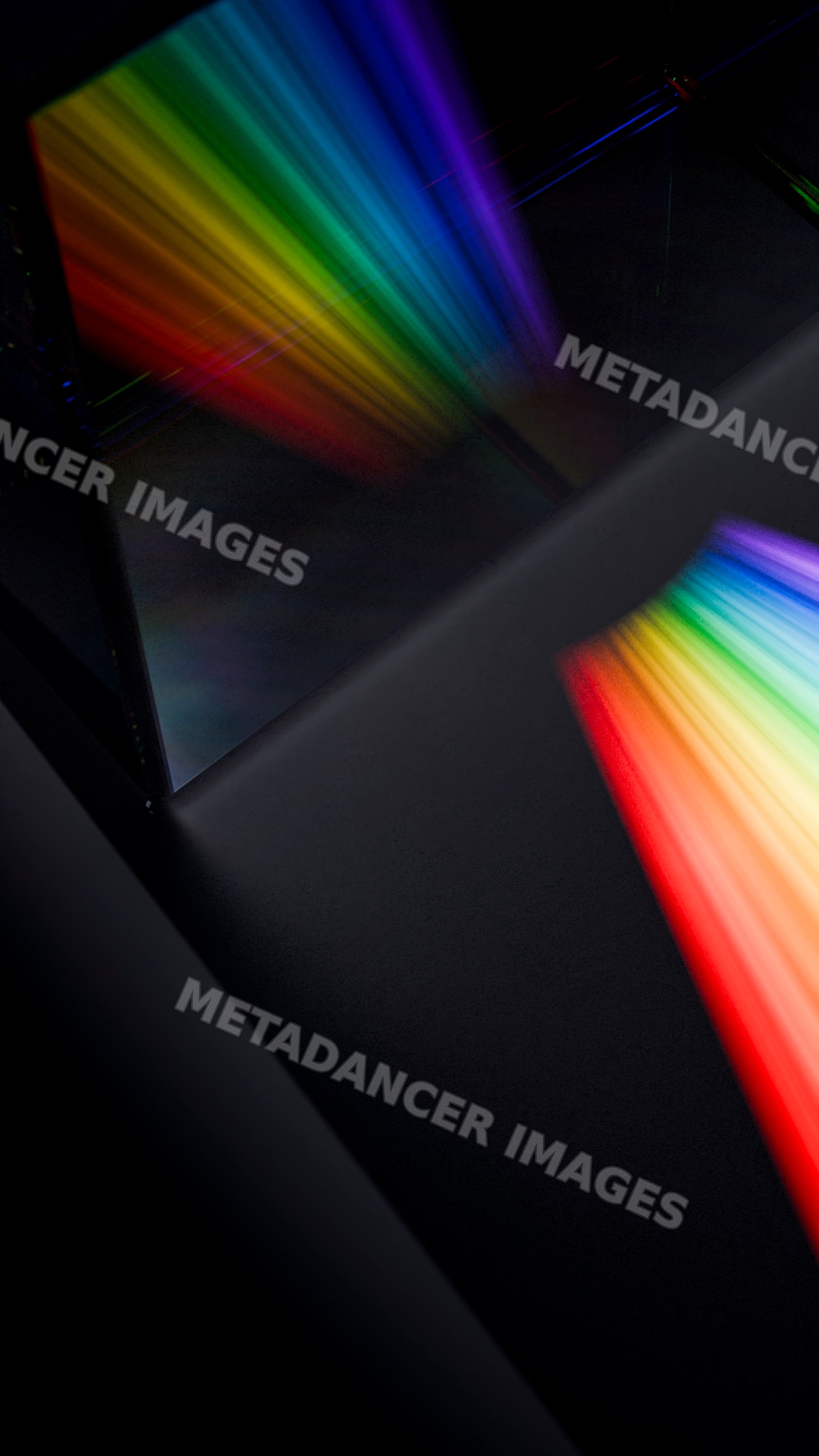 Colorful rainbow light spectrum reflected through prism