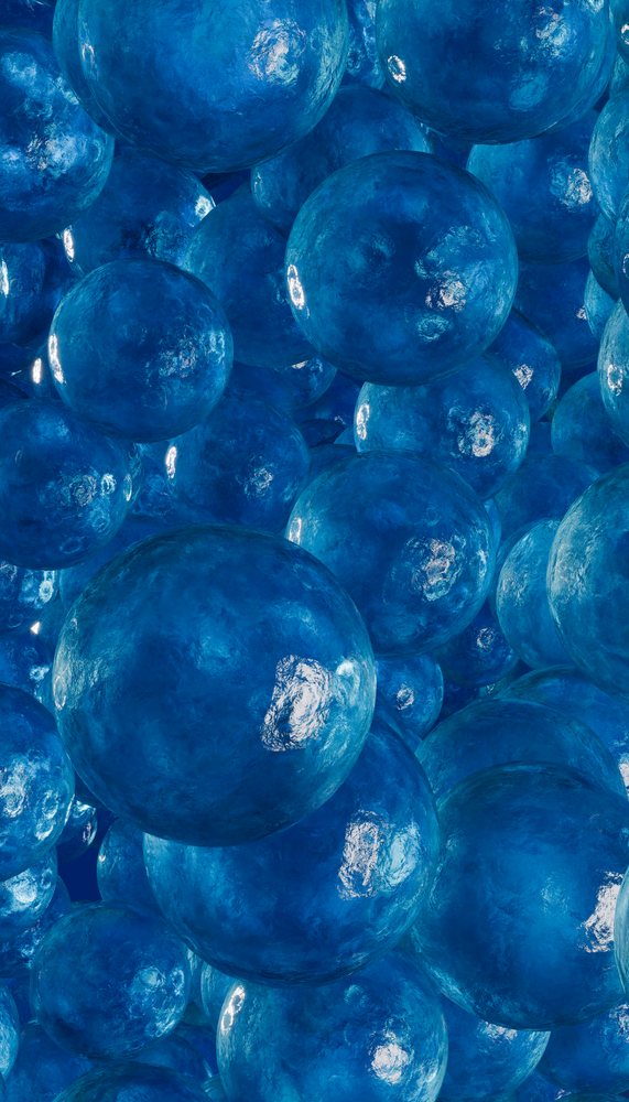 Rendering of glossy blue spheres clustered in an abstract illustration