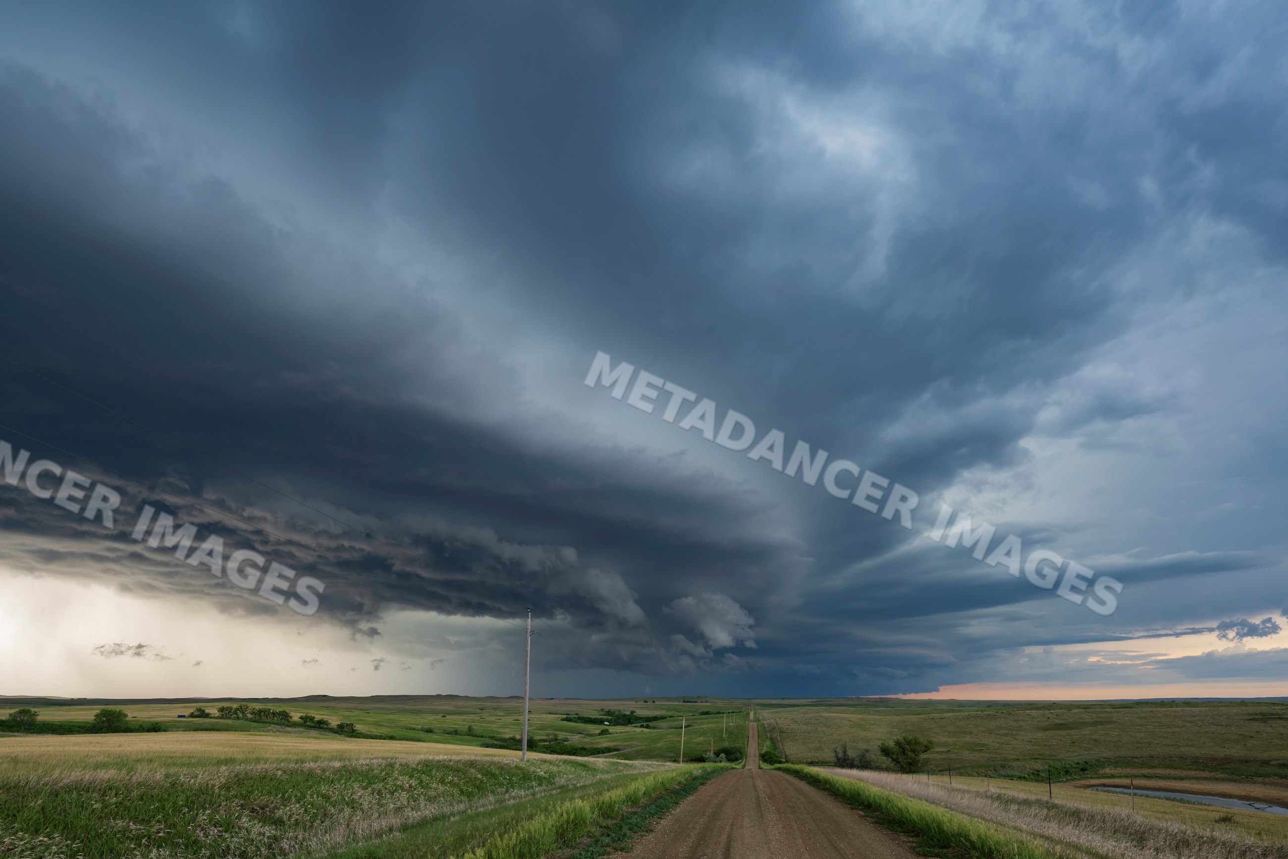 Storm cloud formation over Country Road in south dakota Great Plains
