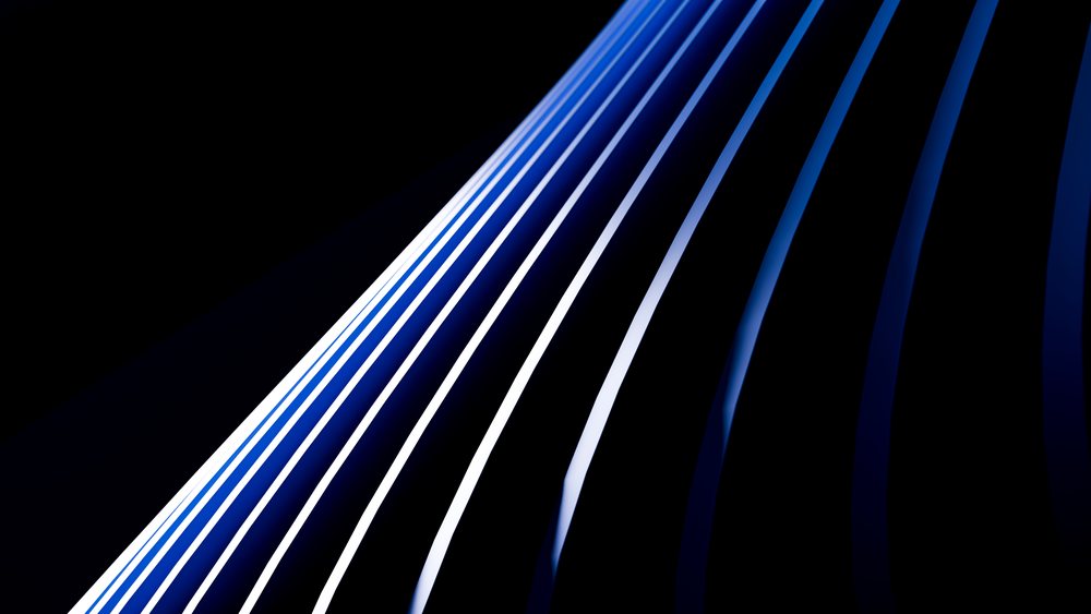 Abstract diagonal blue and white lines on dark background