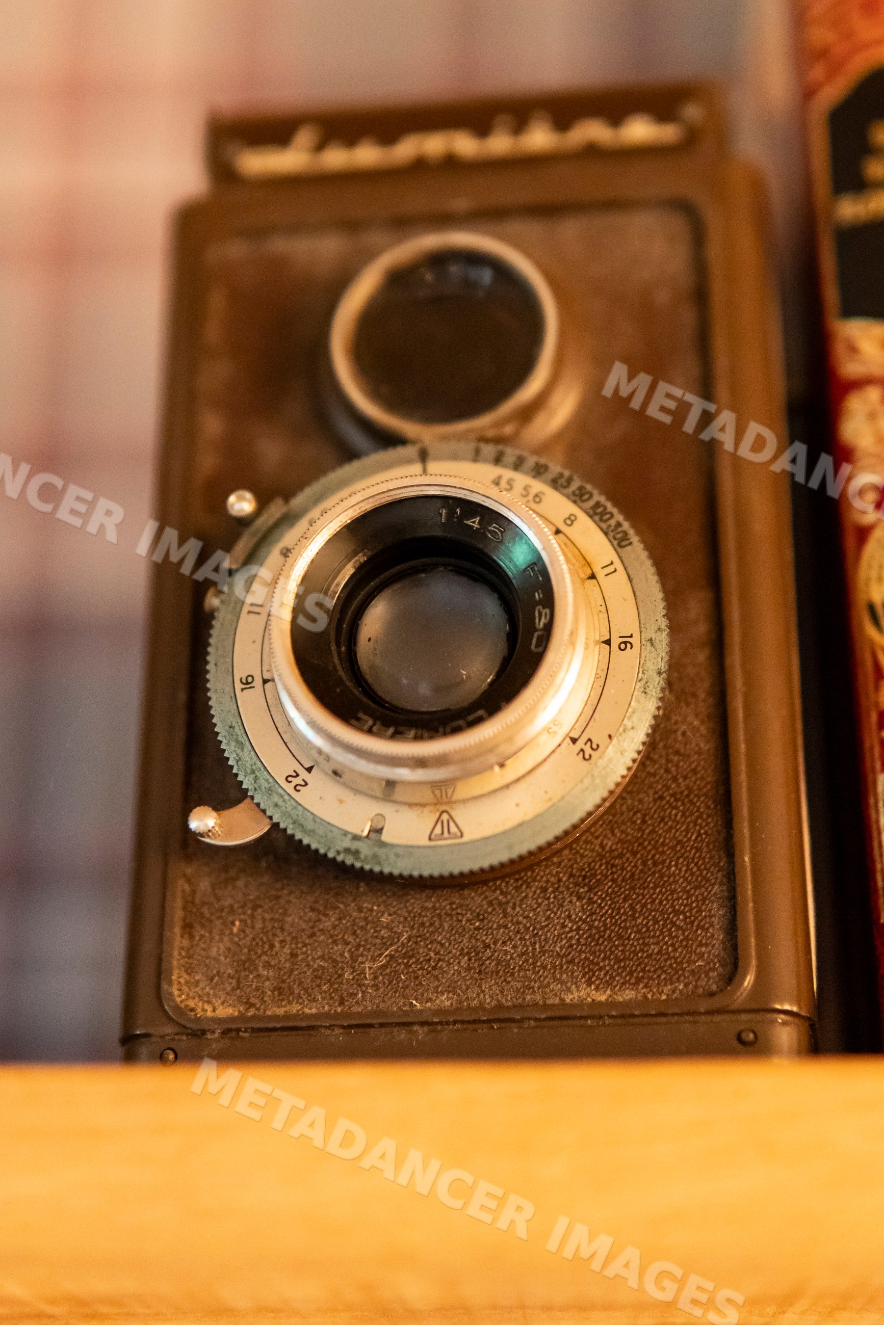 Close-up view of a vintage camera with manual dials