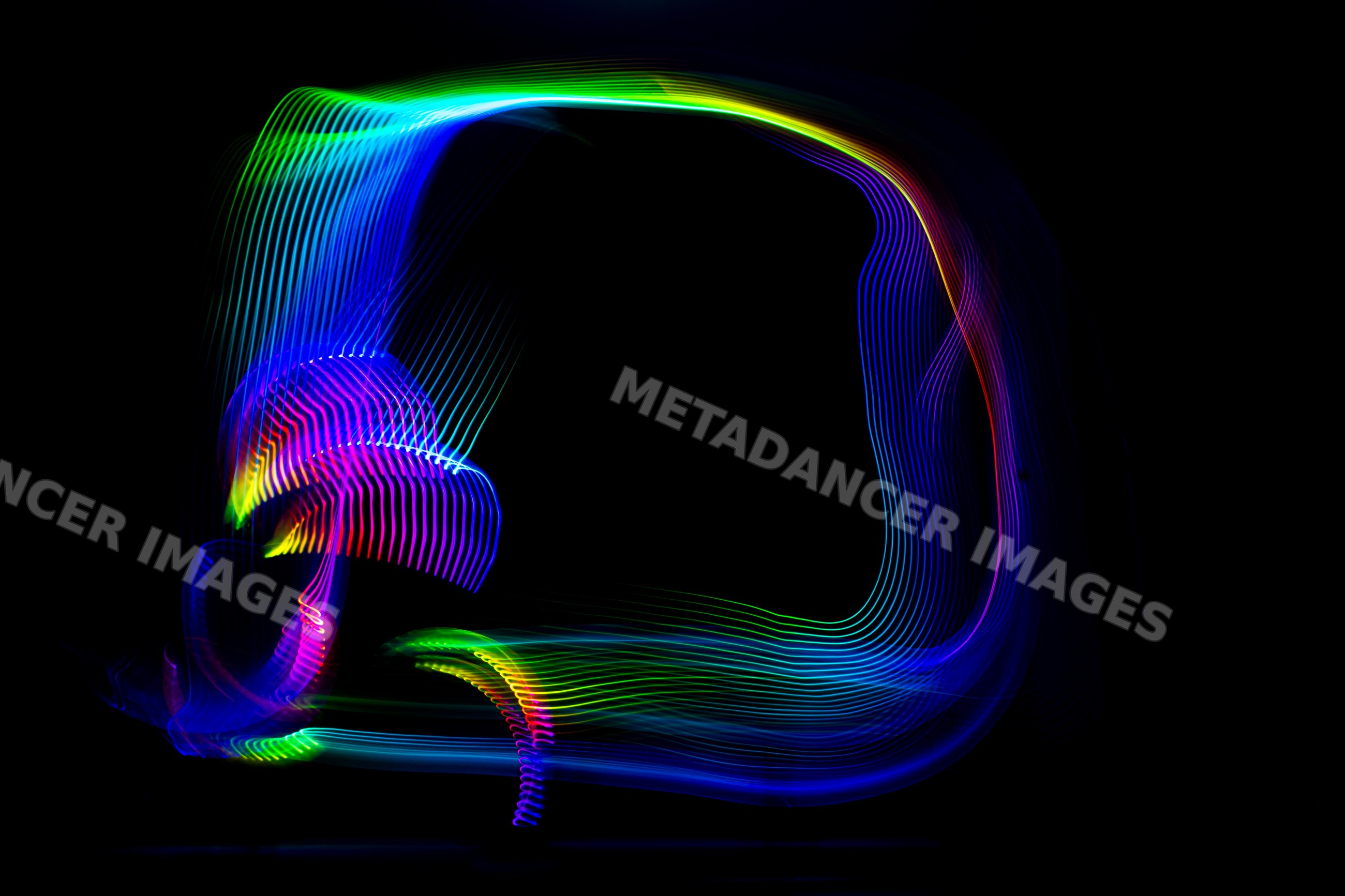 Colorful LED light painting abstract on dark background