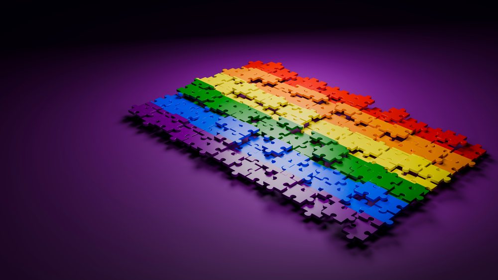 Colorful rainbow jigsaw puzzle with interlocking pieces