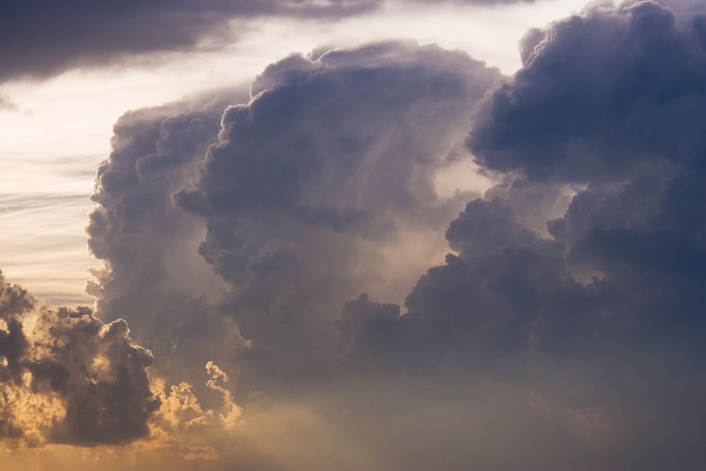 Storm clouds with sunlight filtering through sky in texas