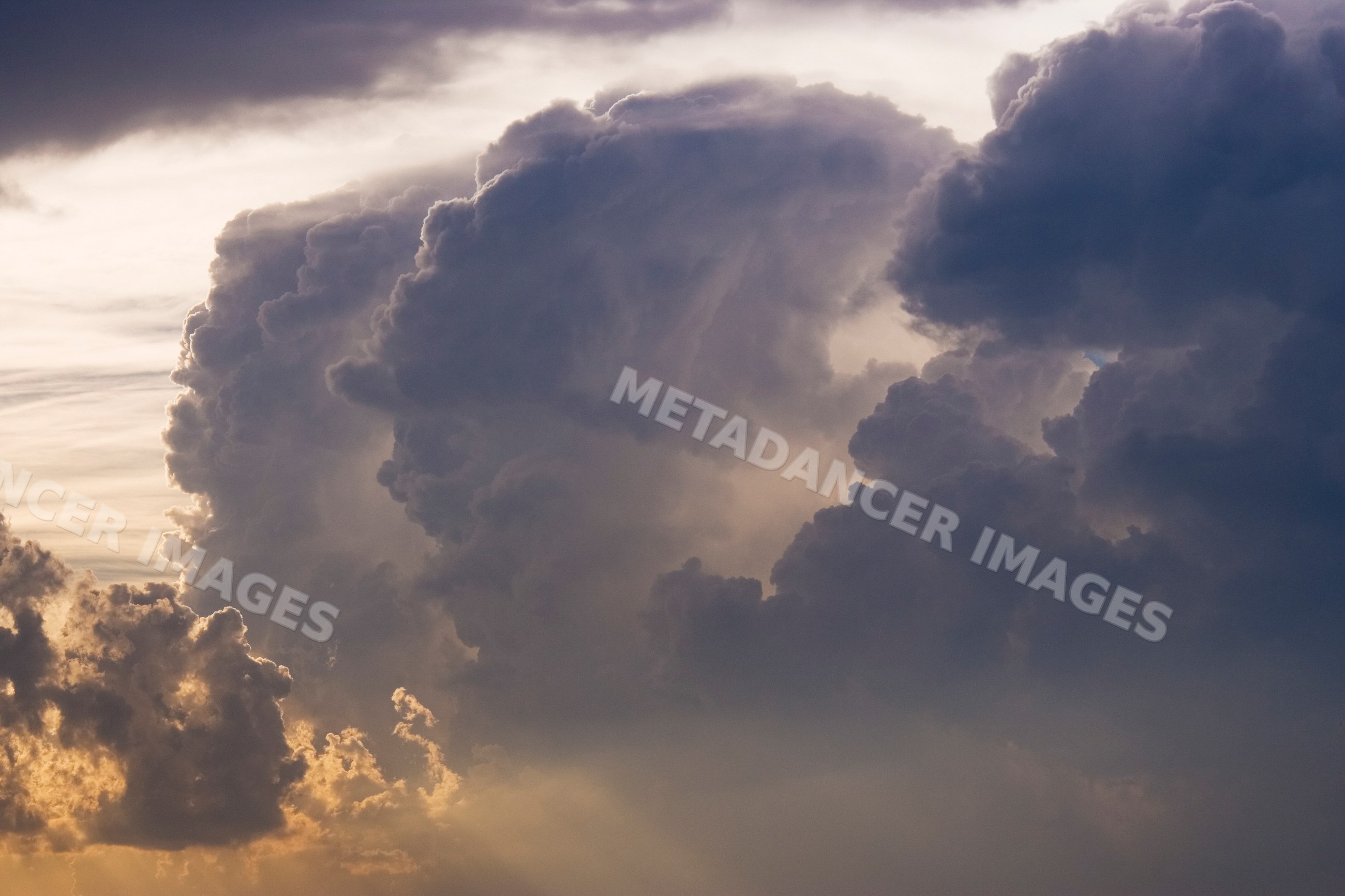 Storm clouds with sunlight filtering through sky in texas