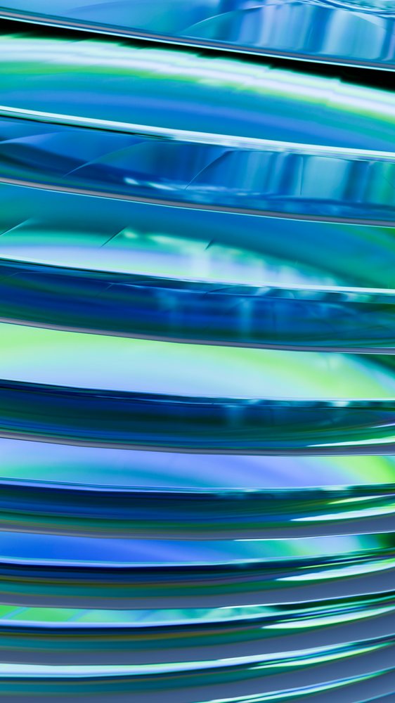 Abstract illustration of smooth curved blue and green reflective