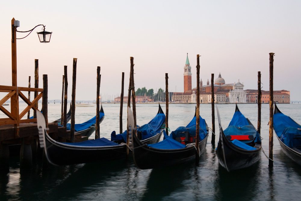 Gondolas moored with san giorgio maggiore in venice