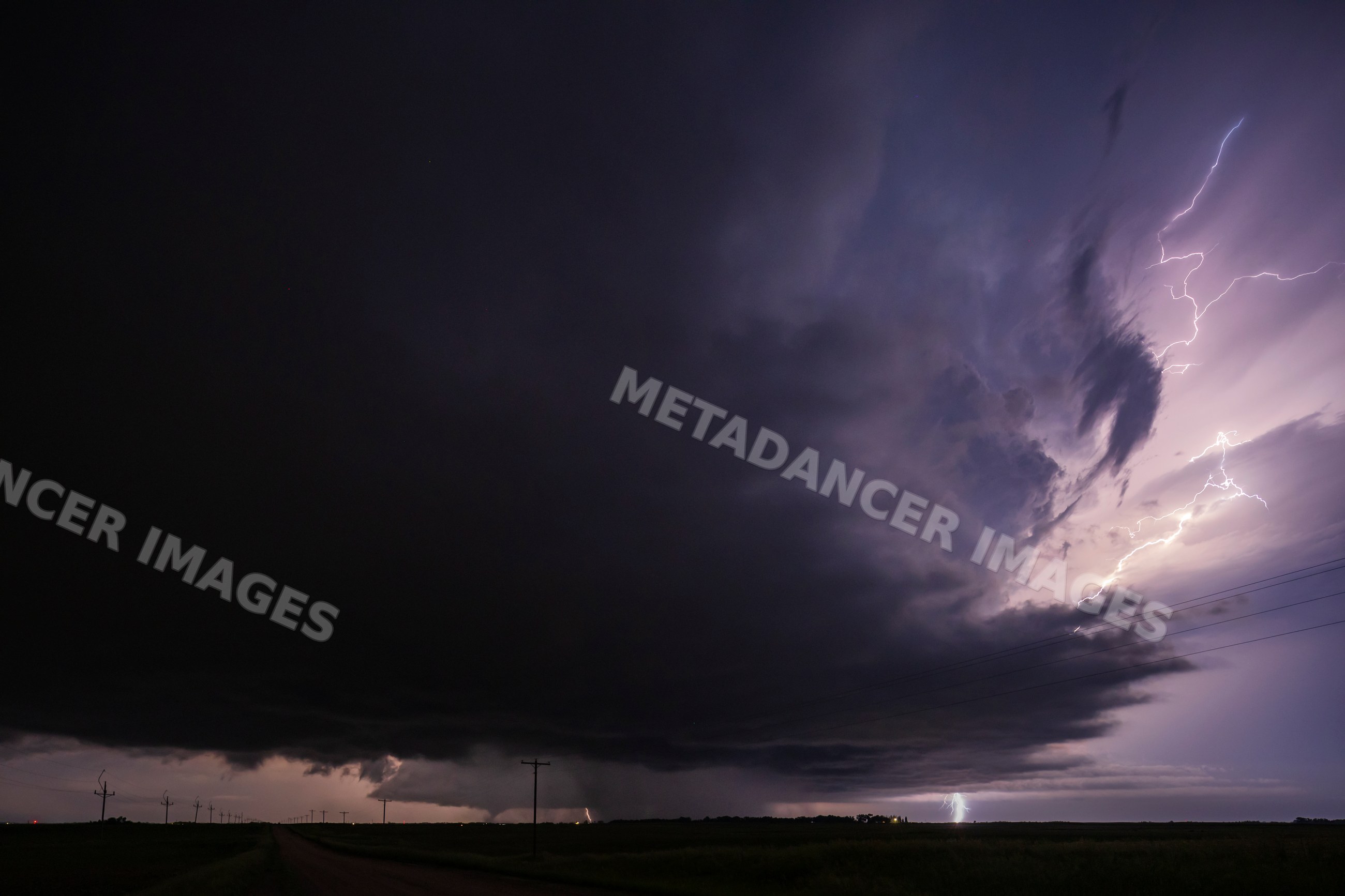 Tornado touching ground with Lightning