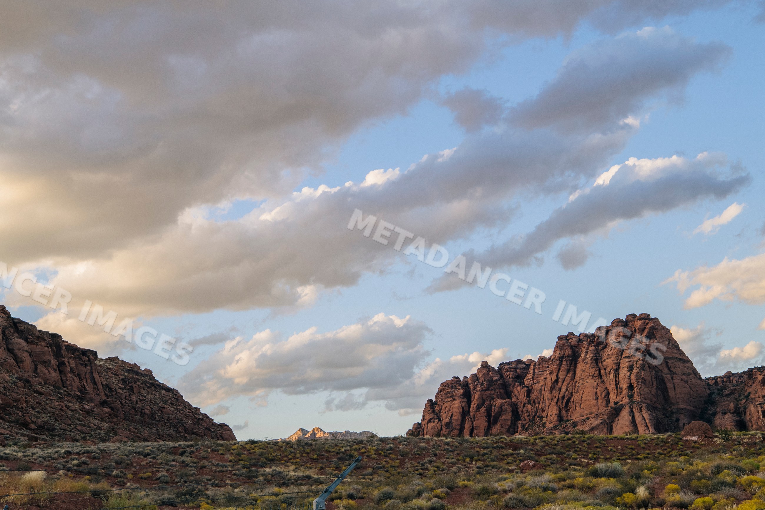 Red Cliffs Desert rock formations under cloudy sky Utah