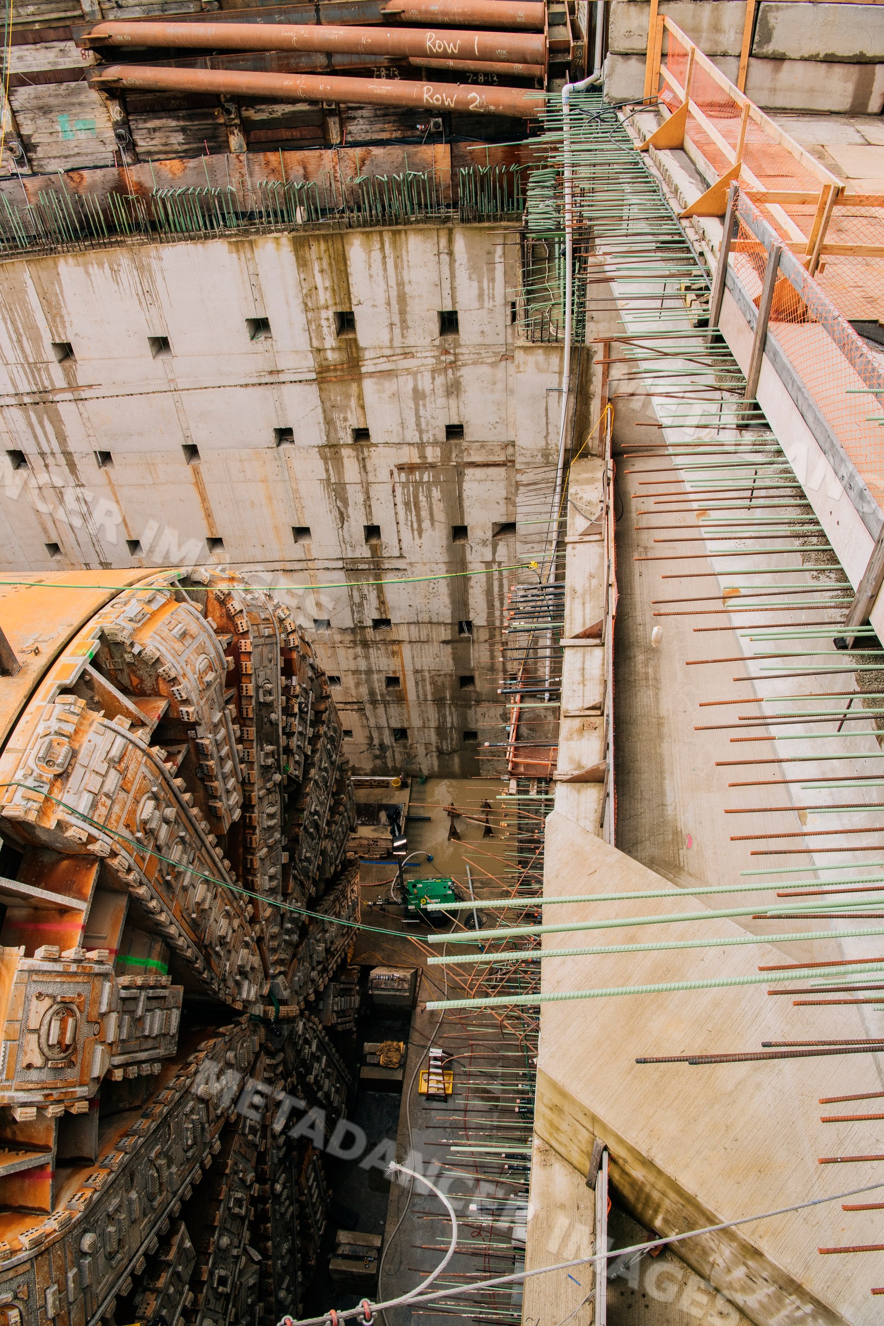 A tunnel boring machine is drilling a tunnel in a construction site