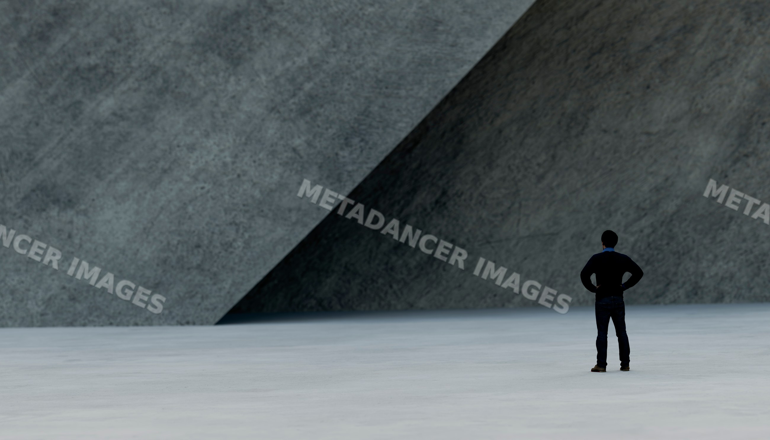 A man stands contemplatively