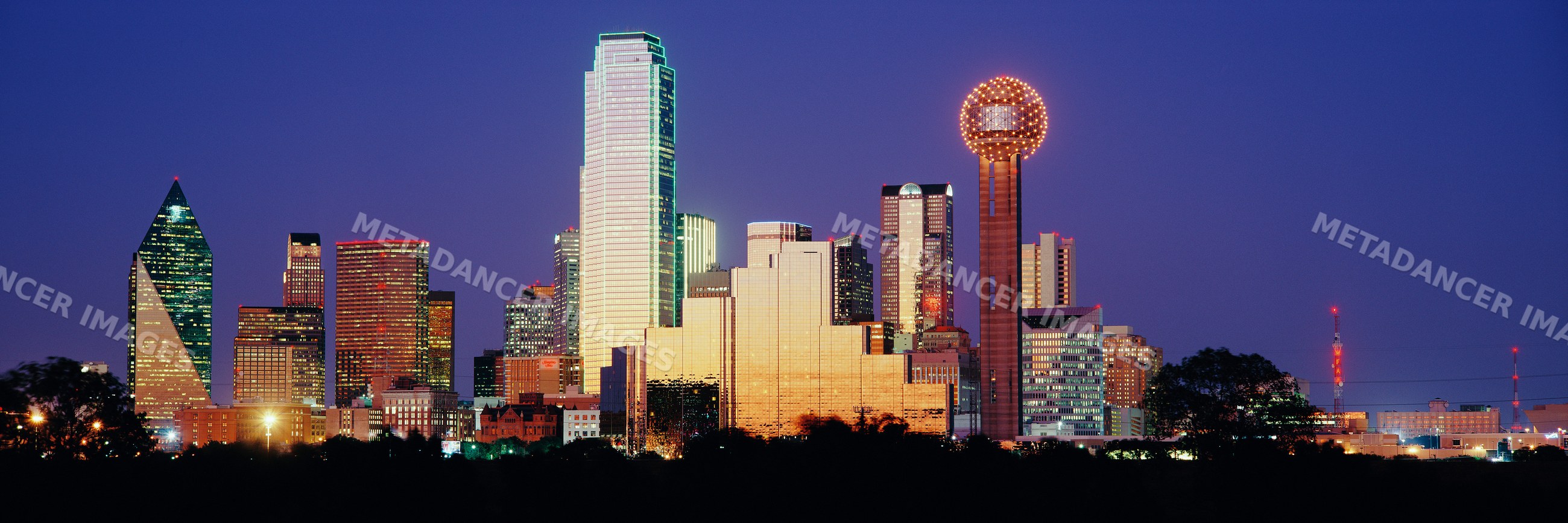 City skyline of dallas texas illuminated at sunset