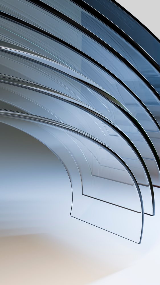 Stacked curved transparent glass sheets with smooth reflective edges