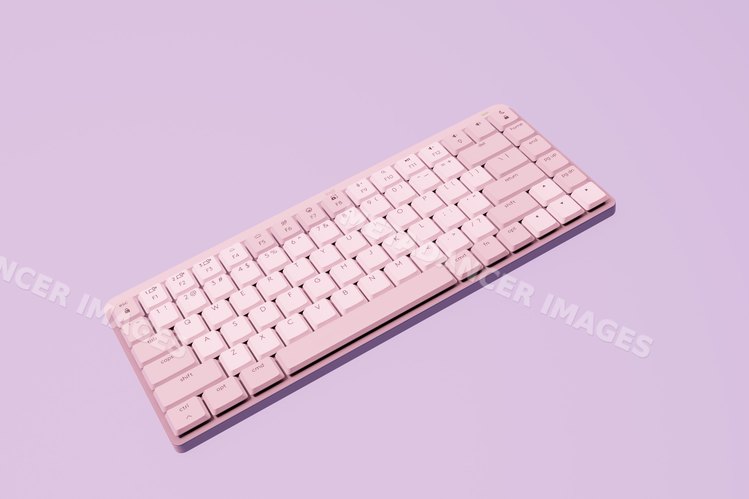 Wireless computer keyboard on a minimalistic pink background