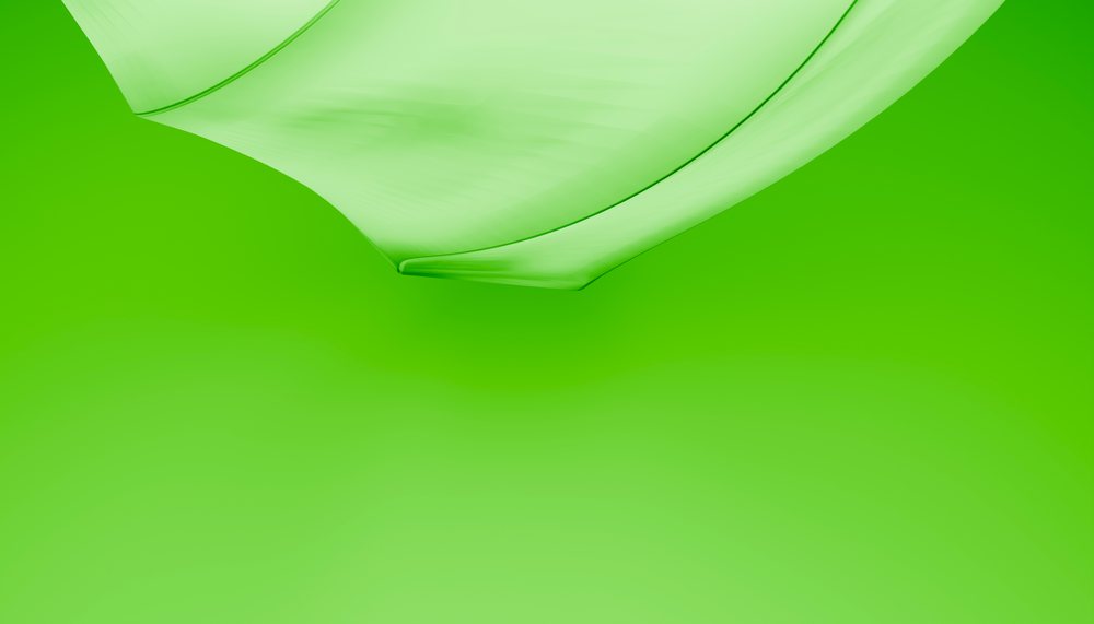 Abstract smooth flowing green fluid shape on bright background