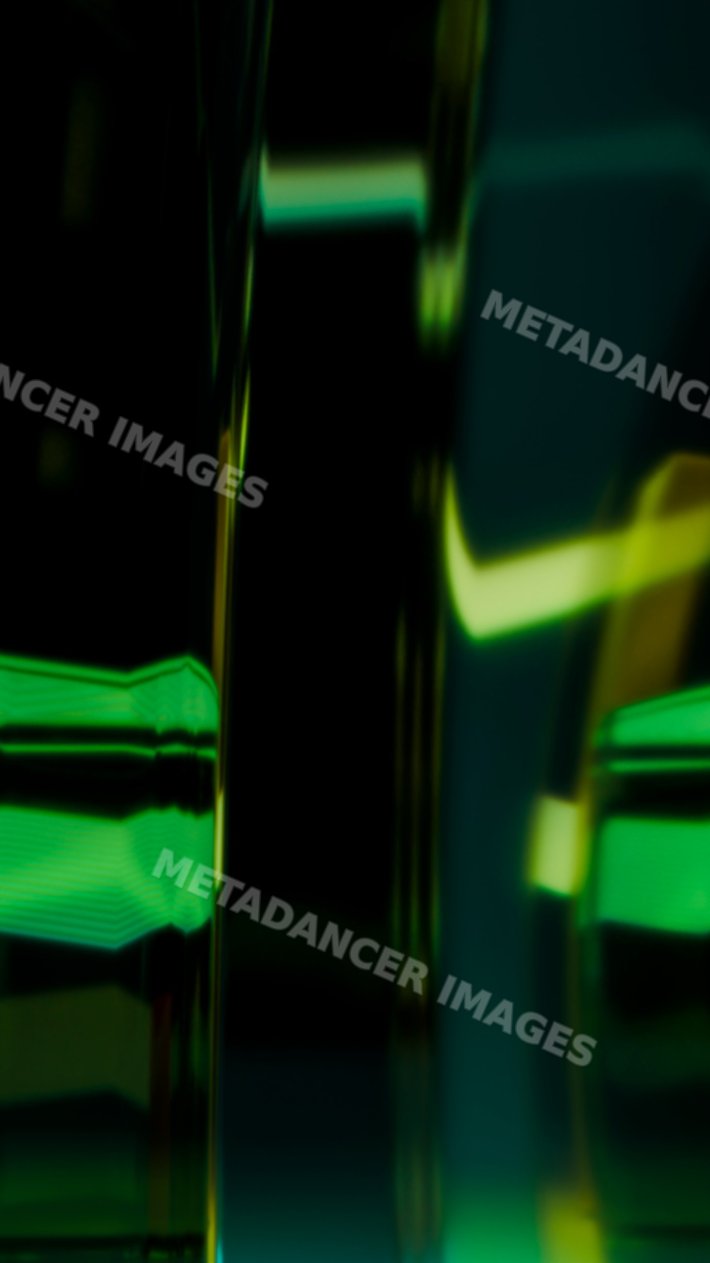 Abstract green and yellow glass reflections with blurred light