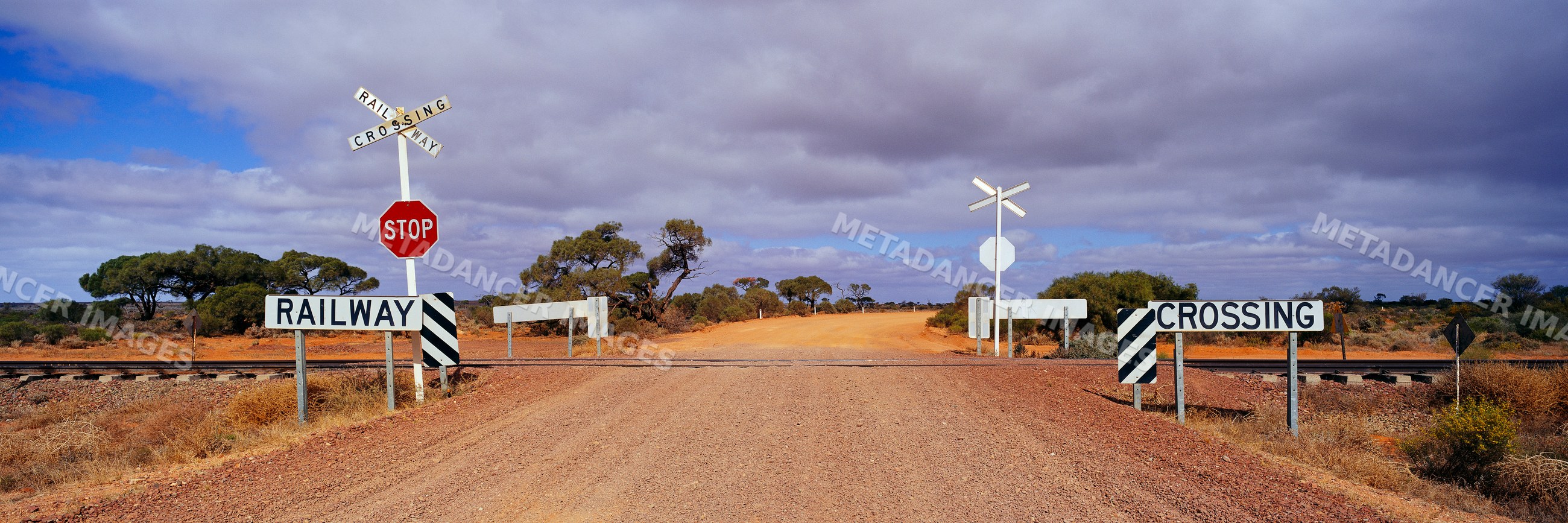 Railway crossing on a dirt road