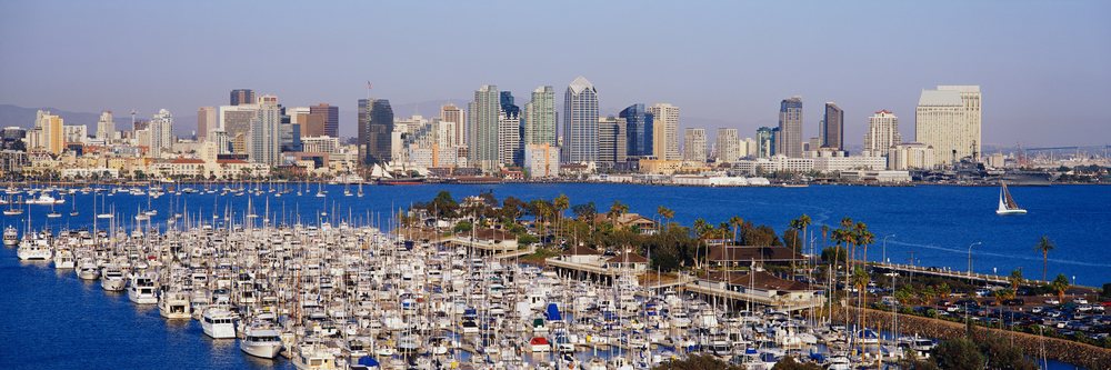 San diego city skyline and marina with sailboats on waterfront