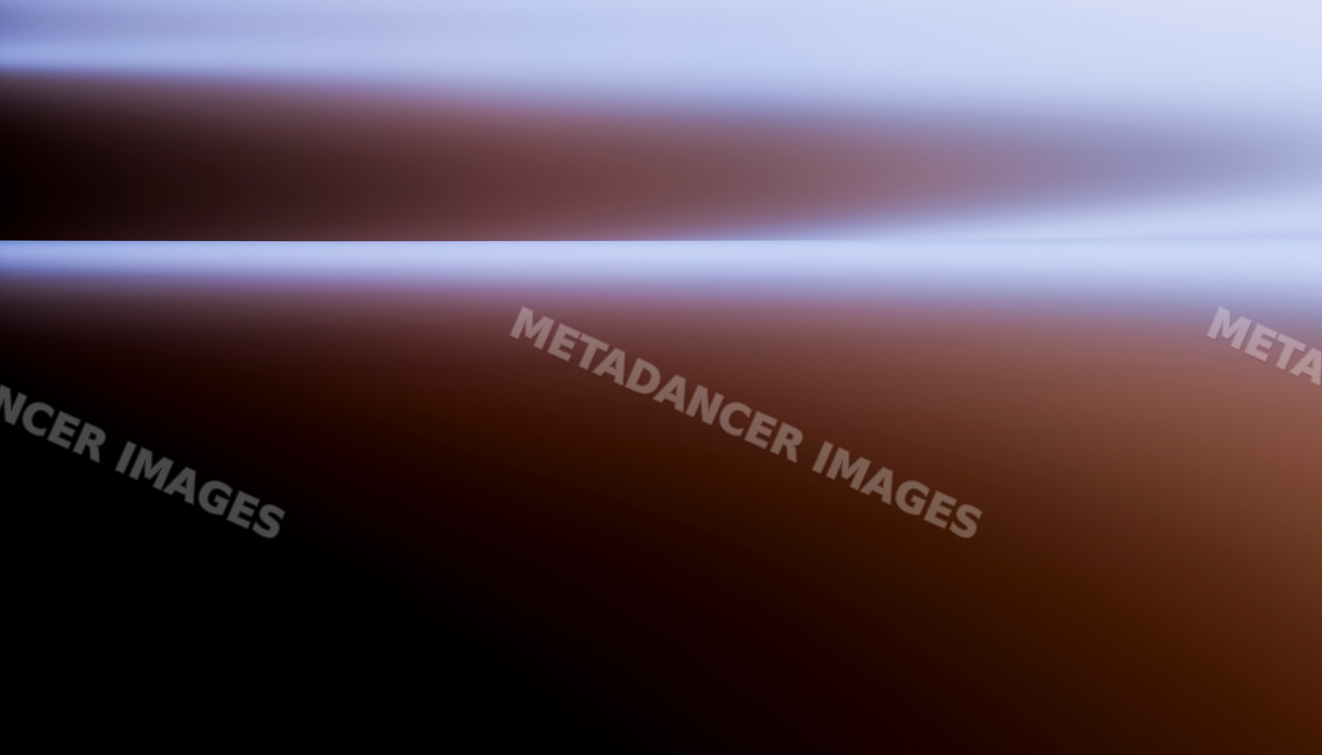 Gradient image with horizontal line separating brown and blue tones