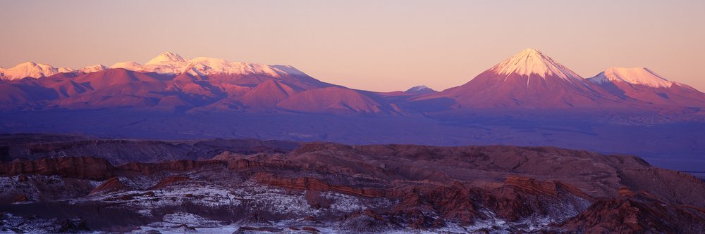 Valle de la luna and licancabur volcano landscape at sunset