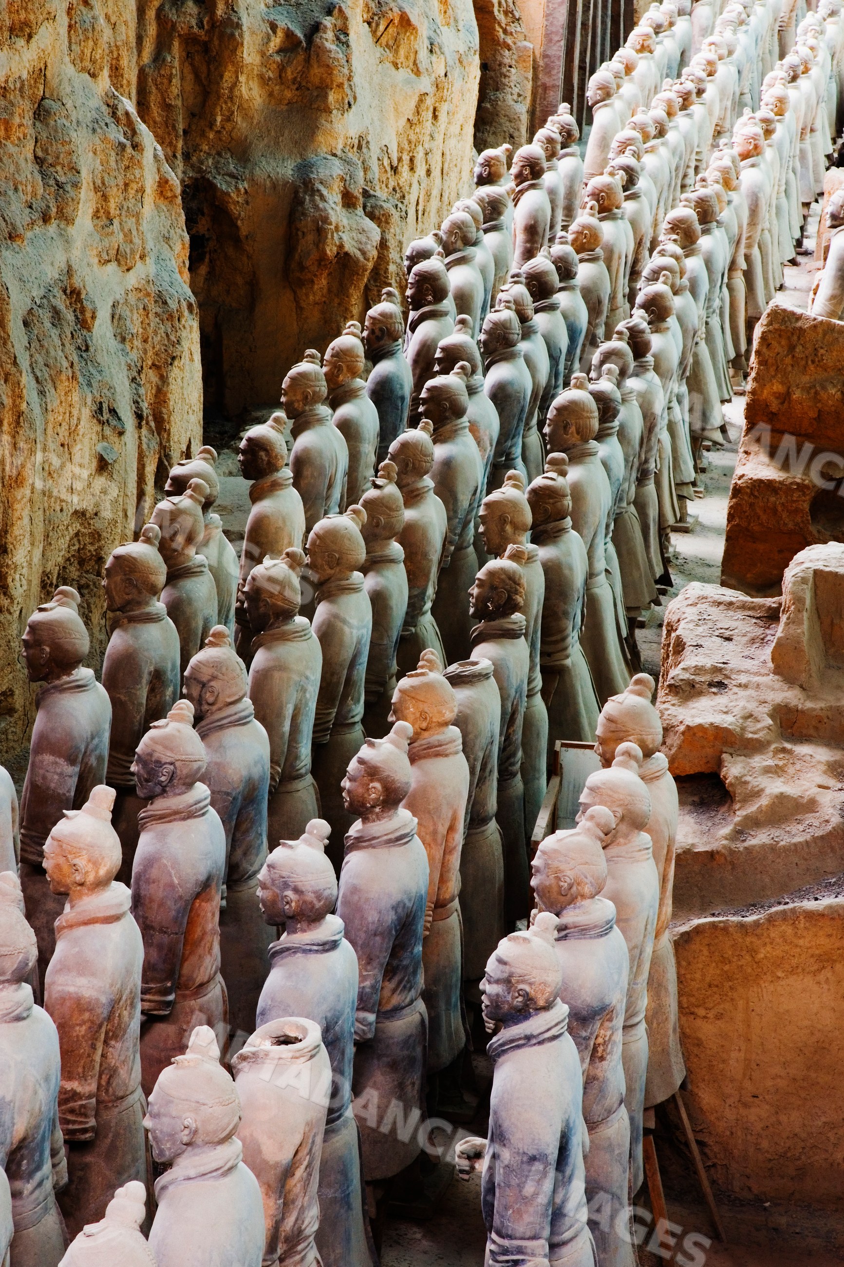 Rows of terracotta warrior statues at excavation site china