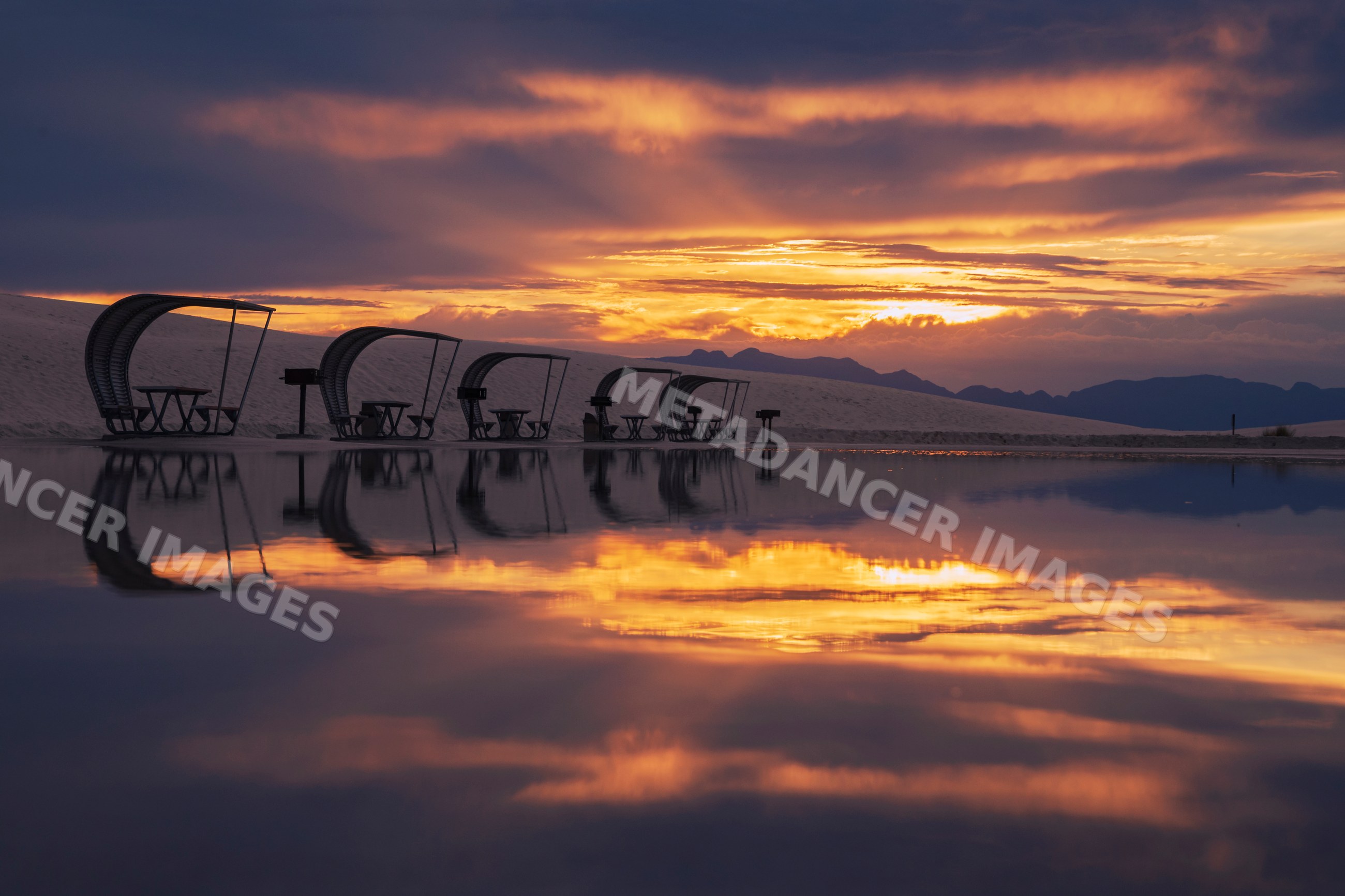Picnic shelters at sunset in white sands national monument desert