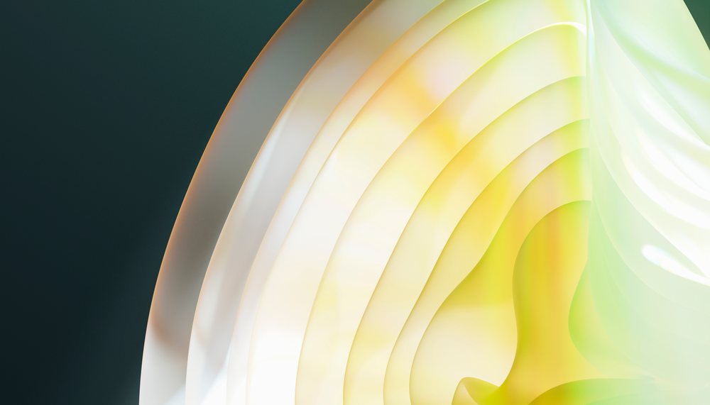 Abstract layered translucent shapes glowing with soft yellow and green
