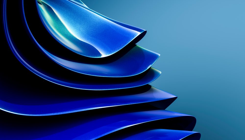 Abstract blue layered curved shapes with smooth shiny surfaces