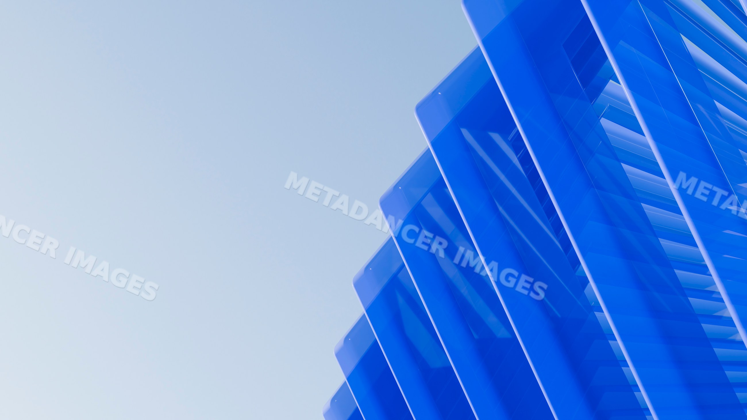 Blue glass architectural panels forming modern geometric structure