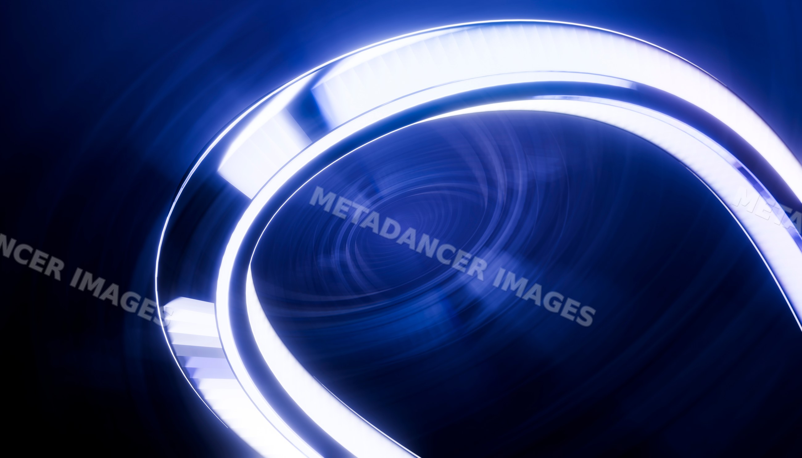 Blue glowing spiral light pattern with motion blur abstract design